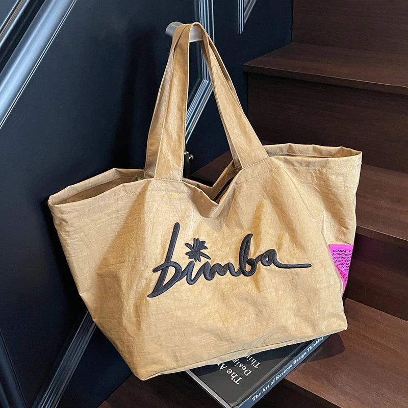 Fashionable and simple large capacity popular solid color handbag, personalized and multifunctional casual letter embroidered sh